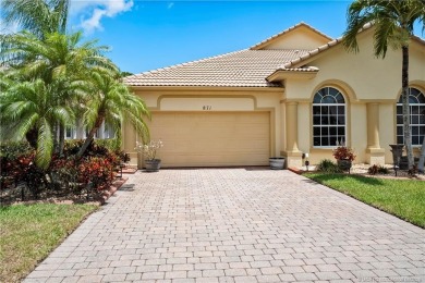 This beautifully maintained 3-bedroom, 2-bath villa with a 2-car on Eagle Marsh Golf Club in Florida - for sale on GolfHomes.com, golf home, golf lot