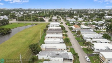 BEAUTIFUL manufactured home in Ravenswood Estates where you own on The Club at Emerald Hills in Florida - for sale on GolfHomes.com, golf home, golf lot