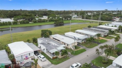 BEAUTIFUL manufactured home in Ravenswood Estates where you own on The Club at Emerald Hills in Florida - for sale on GolfHomes.com, golf home, golf lot