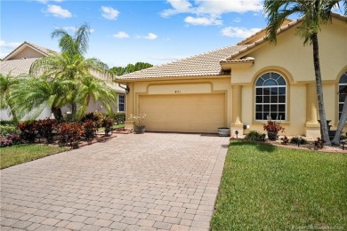 This beautifully maintained 3-bedroom, 2-bath villa with a 2-car on Eagle Marsh Golf Club in Florida - for sale on GolfHomes.com, golf home, golf lot