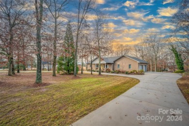 Beautifully Updated Home Located on Woodbridge Golf Course in on Woodbridge Golf Links in North Carolina - for sale on GolfHomes.com, golf home, golf lot