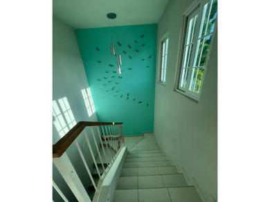 Modern Two-Level Home for Sale with Garden and Terrace
 on  in  - for sale on GolfHomes.com, golf home, golf lot