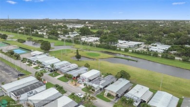 BEAUTIFUL manufactured home in Ravenswood Estates where you own on The Club at Emerald Hills in Florida - for sale on GolfHomes.com, golf home, golf lot