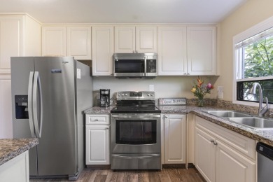 Wailea Ekolu 201 is a ground-floor vacation condominium located on Wailea Golf Club in Hawaii - for sale on GolfHomes.com, golf home, golf lot