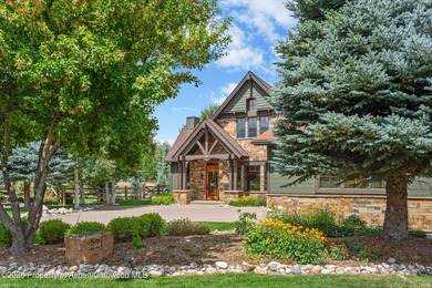 Spacious custom home on the 12th fairway/tee in River Valley on River Valley Ranch Golf Club in Colorado - for sale on GolfHomes.com, golf home, golf lot