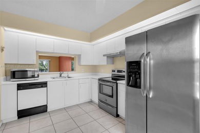 Welcome to this bright and spacious 2-bedroom, 2-bath condo in on Flamingo Lakes Country Club in Florida - for sale on GolfHomes.com, golf home, golf lot