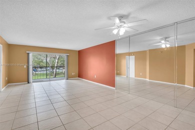 Welcome to this bright and spacious 2-bedroom, 2-bath condo in on Flamingo Lakes Country Club in Florida - for sale on GolfHomes.com, golf home, golf lot