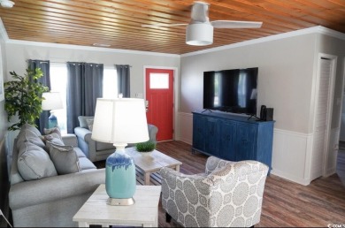 This home is fully updated with new cabinets, appliances, floors on Surf Golf and Beach Club in South Carolina - for sale on GolfHomes.com, golf home, golf lot