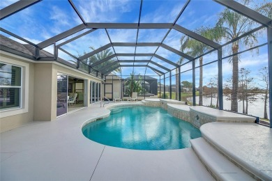 Exquisite Waterfront Home with a Beautiful Solar Heated Pool and on Pennbrooke Fairways in Florida - for sale on GolfHomes.com, golf home, golf lot