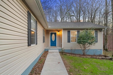 Welcome to your dream home! This 3-4 bedroom house is nestled in on Diamondhead Golf and Country Club in Arkansas - for sale on GolfHomes.com, golf home, golf lot