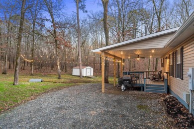 Welcome to your dream home! This 3-4 bedroom house is nestled in on Diamondhead Golf and Country Club in Arkansas - for sale on GolfHomes.com, golf home, golf lot