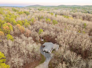 Welcome to your dream home! This 3-4 bedroom house is nestled in on Diamondhead Golf and Country Club in Arkansas - for sale on GolfHomes.com, golf home, golf lot