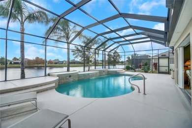 Exquisite Waterfront Home with a Beautiful Solar Heated Pool and on Pennbrooke Fairways in Florida - for sale on GolfHomes.com, golf home, golf lot