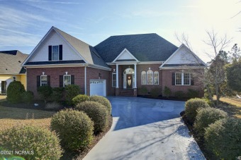 First time on the market, this brick front home is located on a on Players Club At St. James Plantation in North Carolina - for sale on GolfHomes.com, golf home, golf lot