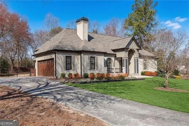 Resort-style living awaits in this beautifully appointed on Royal Lakes Golf and Country Club in Georgia - for sale on GolfHomes.com, golf home, golf lot