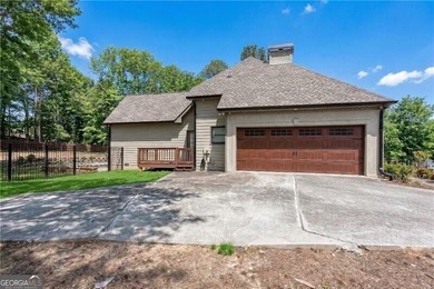 Resort-style living awaits in this beautifully appointed on Royal Lakes Golf and Country Club in Georgia - for sale on GolfHomes.com, golf home, golf lot