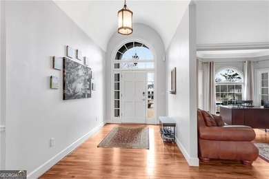 Resort-style living awaits in this beautifully appointed on Royal Lakes Golf and Country Club in Georgia - for sale on GolfHomes.com, golf home, golf lot