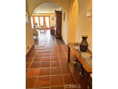 This is a beautiful custom built Spanish Style Home.  This home on Apple Valley Country Club in California - for sale on GolfHomes.com, golf home, golf lot