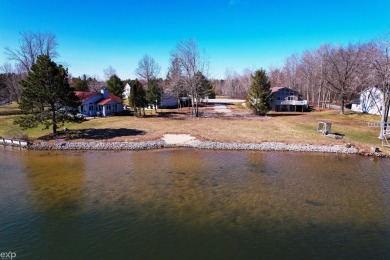 Absolutely Stunning Views on this  1/2  acre lakefront lot with on Lakeside Golf Course in Michigan - for sale on GolfHomes.com, golf home, golf lot