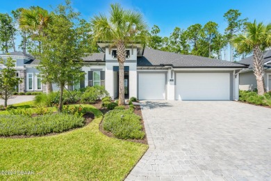 Welcome to your dream home in the highly sought-after gated golf on Plantation Bay Golf and Country Club in Florida - for sale on GolfHomes.com, golf home, golf lot