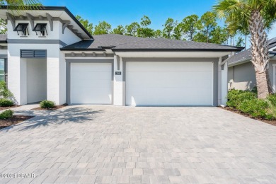 Welcome to your dream home in the highly sought-after gated golf on Plantation Bay Golf and Country Club in Florida - for sale on GolfHomes.com, golf home, golf lot