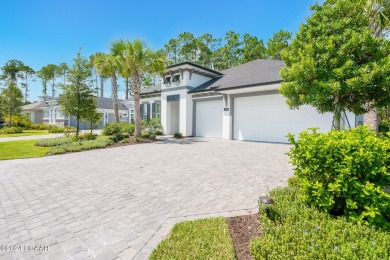 Welcome to your dream home in the highly sought-after gated golf on Plantation Bay Golf and Country Club in Florida - for sale on GolfHomes.com, golf home, golf lot