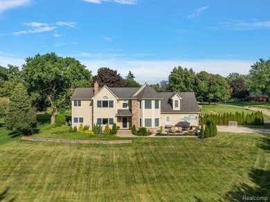 Experience luxury living in this beautifully renovated colonial on Forest Lake Country Club in Michigan - for sale on GolfHomes.com, golf home, golf lot