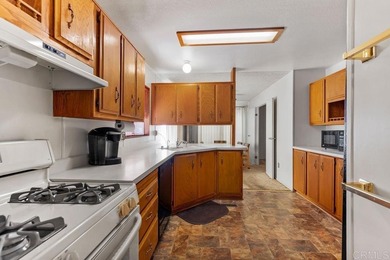 Golfer's paradise in Lakeside, a dream home on the fairway on Willowbrook Golf Course in California - for sale on GolfHomes.com, golf home, golf lot