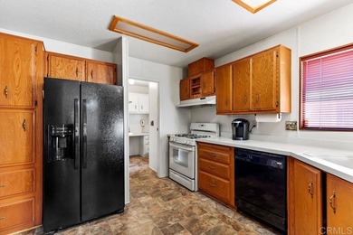 Golfer's paradise in Lakeside, a dream home on the fairway on Willowbrook Golf Course in California - for sale on GolfHomes.com, golf home, golf lot