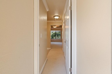 Light-filled townhouse featuring a kitchen with granite counters on Ridgemark Golf and Country Club in California - for sale on GolfHomes.com, golf home, golf lot
