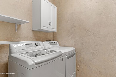 Enjoy fantastic golf course scenery from this Wedgewood property on Spruce Creek Golf Club in Florida - for sale on GolfHomes.com, golf home, golf lot