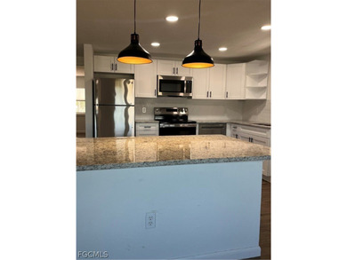 Come make this beautifully remodeled home YOURS!!!. NEW FLOORS on Six Lakes Country Club in Florida - for sale on GolfHomes.com, golf home, golf lot