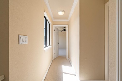Light-filled townhouse featuring a kitchen with granite counters on Ridgemark Golf and Country Club in California - for sale on GolfHomes.com, golf home, golf lot