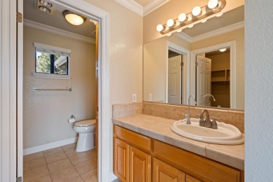 Light-filled townhouse featuring a kitchen with granite counters on Ridgemark Golf and Country Club in California - for sale on GolfHomes.com, golf home, golf lot