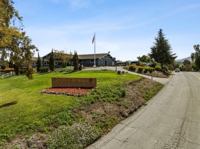 Light-filled townhouse featuring a kitchen with granite counters on Ridgemark Golf and Country Club in California - for sale on GolfHomes.com, golf home, golf lot