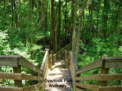 Enjoy fantastic golf course scenery from this Wedgewood property on Spruce Creek Golf Club in Florida - for sale on GolfHomes.com, golf home, golf lot