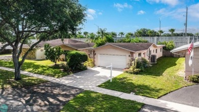 A rare offering in one of South Florida's most cherished on Cooper Colony Country Club in Florida - for sale on GolfHomes.com, golf home, golf lot