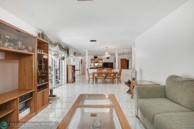 A rare offering in one of South Florida's most cherished on Cooper Colony Country Club in Florida - for sale on GolfHomes.com, golf home, golf lot