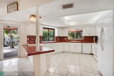 A rare offering in one of South Florida's most cherished on Cooper Colony Country Club in Florida - for sale on GolfHomes.com, golf home, golf lot