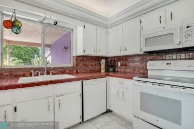 A rare offering in one of South Florida's most cherished on Cooper Colony Country Club in Florida - for sale on GolfHomes.com, golf home, golf lot