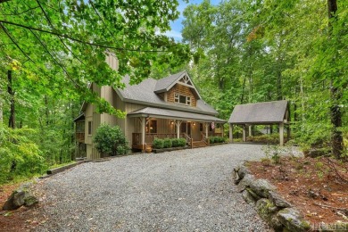 This beautiful, fully furnished, 3-bedroom, 2.5-bath wood cabin on Sapphire National Golf Club in North Carolina - for sale on GolfHomes.com, golf home, golf lot