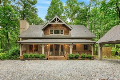 This beautiful, fully furnished, 3-bedroom, 2.5-bath wood cabin on Sapphire National Golf Club in North Carolina - for sale on GolfHomes.com, golf home, golf lot