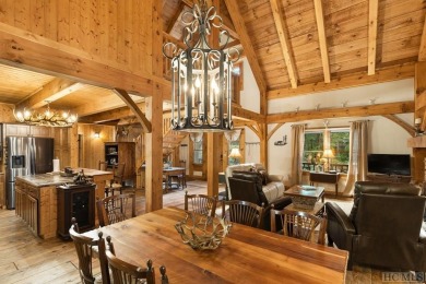 This beautiful, fully furnished, 3-bedroom, 2.5-bath wood cabin on Sapphire National Golf Club in North Carolina - for sale on GolfHomes.com, golf home, golf lot