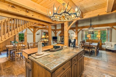 This beautiful, fully furnished, 3-bedroom, 2.5-bath wood cabin on Sapphire National Golf Club in North Carolina - for sale on GolfHomes.com, golf home, golf lot