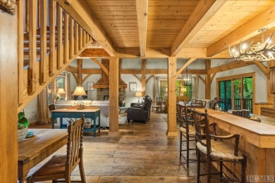 This beautiful, fully furnished, 3-bedroom, 2.5-bath wood cabin on Sapphire National Golf Club in North Carolina - for sale on GolfHomes.com, golf home, golf lot