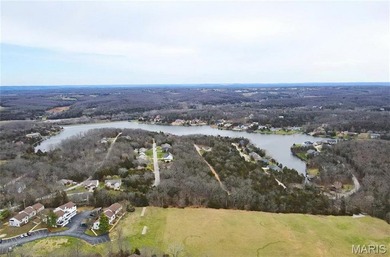 TWO LOTS for the price of ONE in beautiful, sought-after on Raintree Country Club in Missouri - for sale on GolfHomes.com, golf home, golf lot