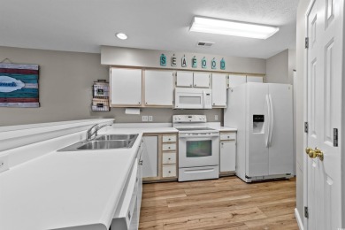 This unit is located on the second floor overlooking the 17th on True Blue Plantation in South Carolina - for sale on GolfHomes.com, golf home, golf lot