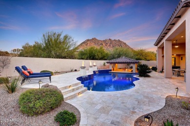 Perched on an elevated cul-de-sac lot within the guarded gates on Troon Country Club in Arizona - for sale on GolfHomes.com, golf home, golf lot