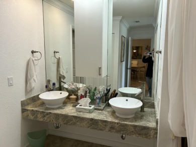 Lake and golf views from this spacious, remodeled 2nd floor unit on Boca Lago Golf and Country Club in Florida - for sale on GolfHomes.com, golf home, golf lot