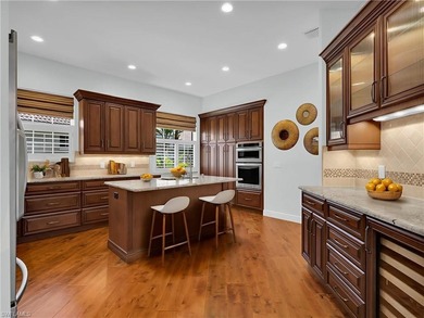 Located in the Cotton Green neighborhood of Fiddler's Creek on The Rookery At Marco in Florida - for sale on GolfHomes.com, golf home, golf lot